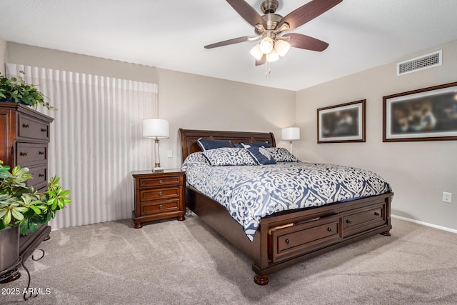 bedroom featuring light carpet and ceiling fan