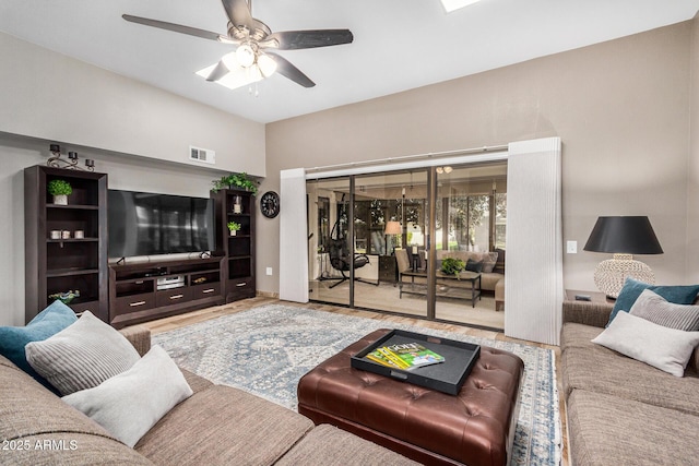 living room with ceiling fan