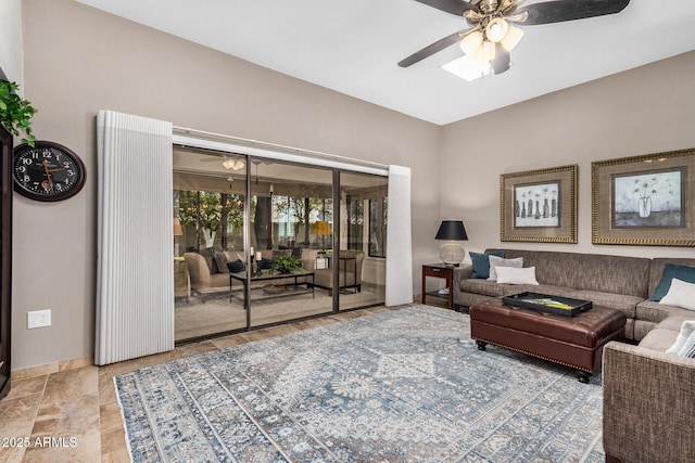 living room with ceiling fan