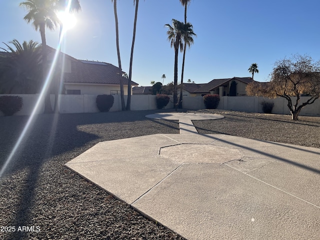 exterior space with a fenced backyard and a patio