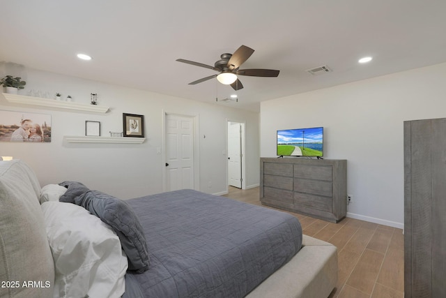 bedroom with wood-type flooring and ceiling fan