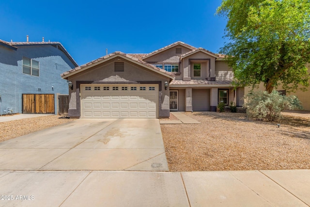 634 W Aviary Way, Gilbert, AZ 85233 - view of front of property featuring stucco siding, concrete driveway, a tiled roof, and a garage