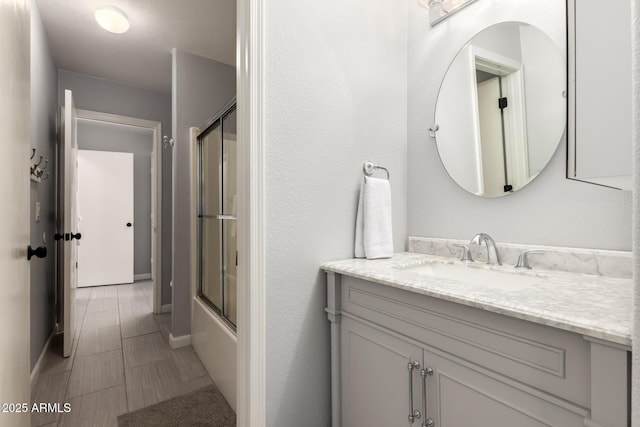634 W Aviary Way, Gilbert, AZ 85233 - full bathroom featuring vanity, shower / bath combination with glass door, and baseboards