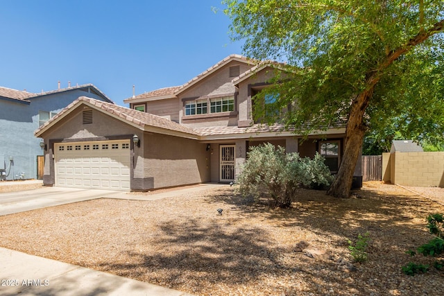 634 W Aviary Way, Gilbert, AZ 85233 - view of front of property with fence, stucco siding, an attached garage, a tiled roof, and concrete driveway