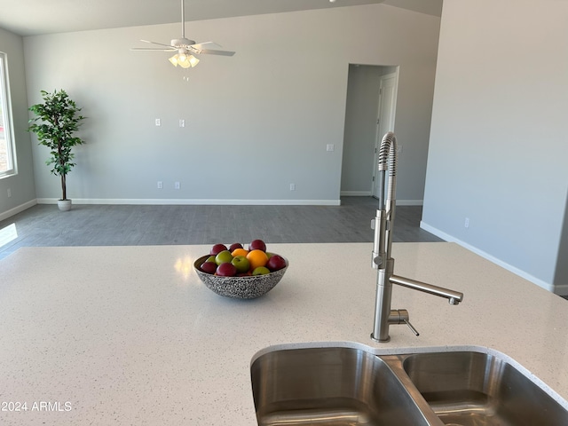 kitchen featuring sink and vaulted ceiling