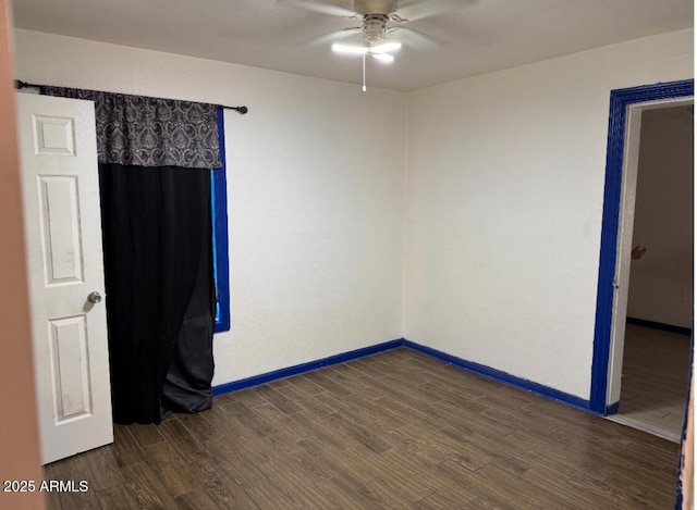 3112 W Taylor St, Phoenix, AZ 85009 - spare room with ceiling fan, dark wood finished floors, and baseboards