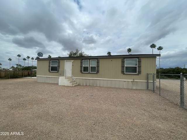 manufactured / mobile home featuring fence