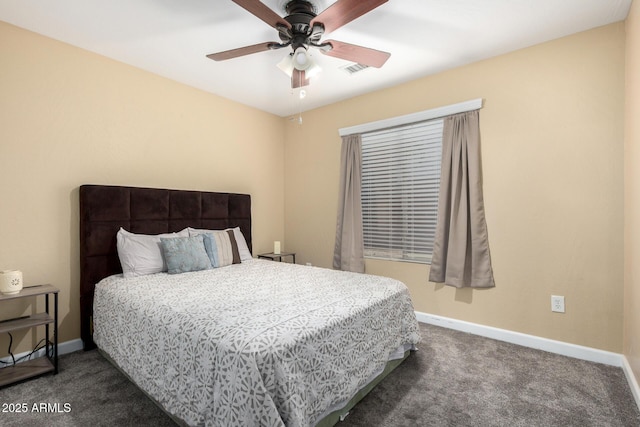 carpeted bedroom with baseboards, a ceiling fan, and visible vents