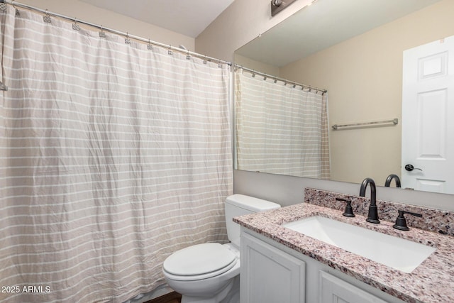 full bath with toilet and vanity