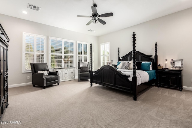 bedroom featuring light carpet, baseboards, visible vents, and recessed lighting