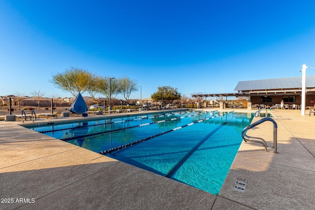 pool with a patio area