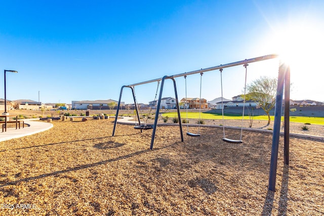 communal playground with a residential view