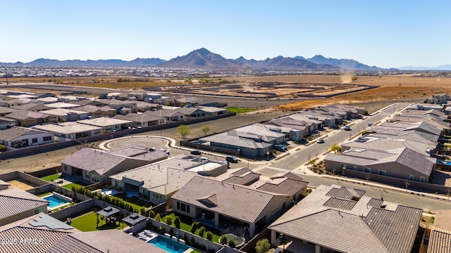 bird's eye view with a residential view and a mountain view