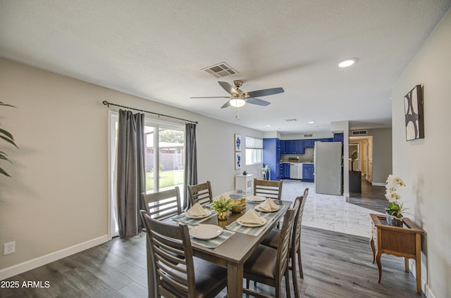8523 W Whitton Ave, Phoenix, AZ 85037 - dining room with ceiling fan, baseboards, dark wood-style floors, and recessed lighting