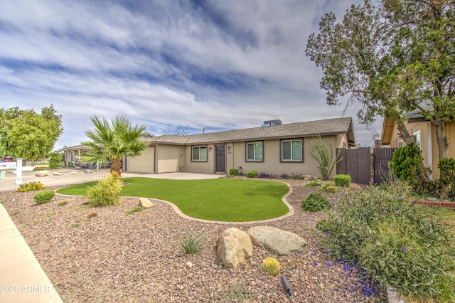 8523 W Whitton Ave, Phoenix, AZ 85037 - ranch-style home with an attached garage, stucco siding, and driveway