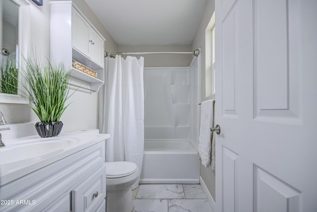 8523 W Whitton Ave, Phoenix, AZ 85037 - bathroom featuring vanity, shower / tub combo, toilet, marble finish floors, and baseboards