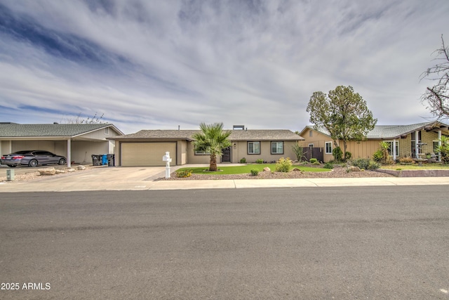 8523 W Whitton Ave, Phoenix, AZ 85037 - ranch-style home featuring concrete driveway and an attached garage
