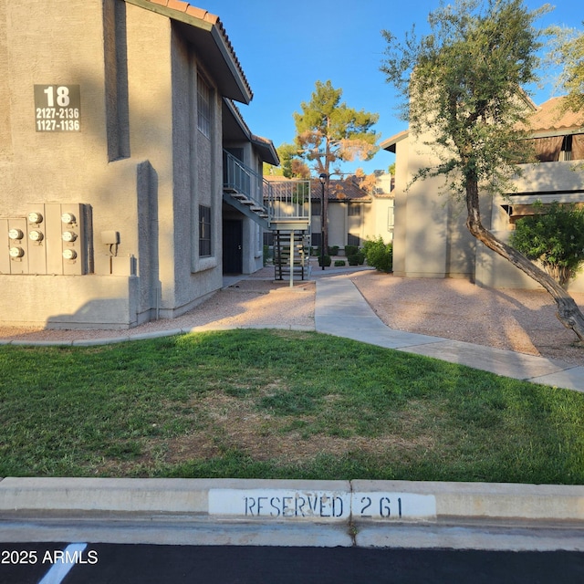 533 W Guadalupe Rd Unit 2126, Mesa, AZ 85210 - view of green lawn featuring stairs