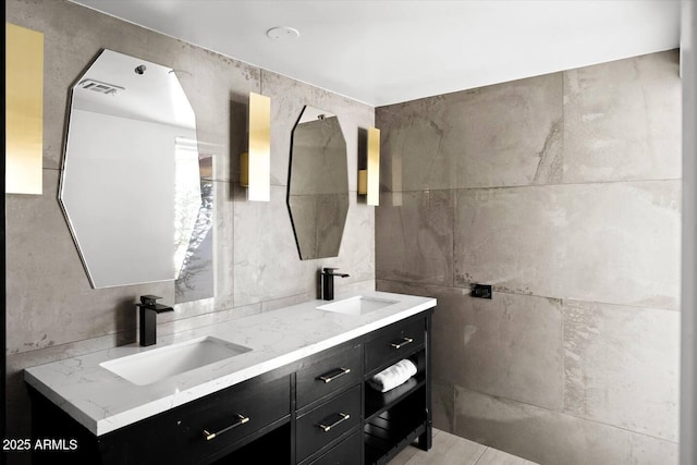 7508 N 13th Ave, Phoenix, AZ 85021 - full bathroom featuring double vanity and tile walls
