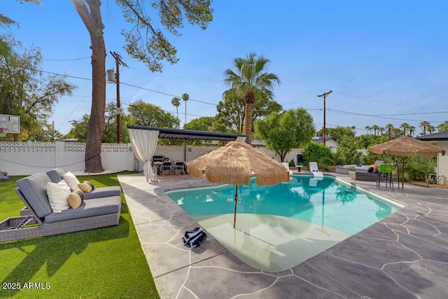 7508 N 13th Ave, Phoenix, AZ 85021 - view of swimming pool with a patio area, a fenced backyard, and an outdoor living space