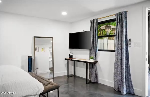 7508 N 13th Ave, Phoenix, AZ 85021 - bedroom with finished concrete floors, baseboards, and recessed lighting