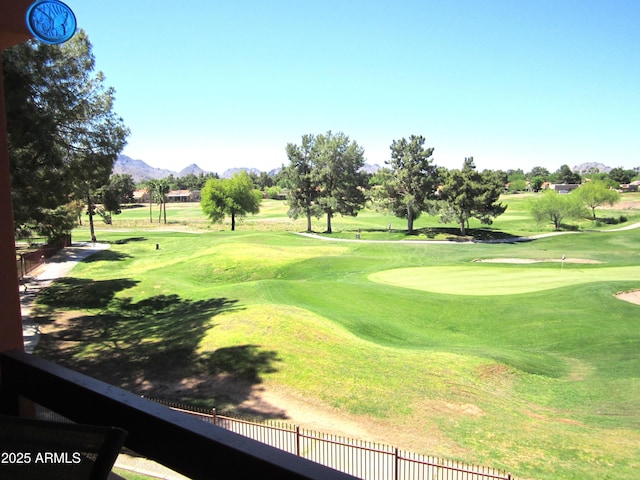 view of community featuring a mountain view and golf course view