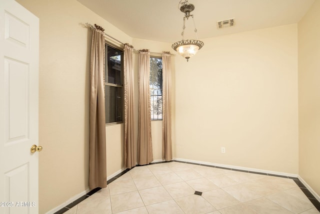 view of tiled spare room