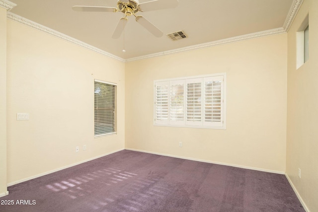 carpeted spare room featuring crown molding and ceiling fan