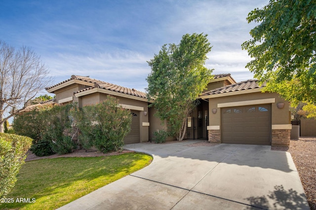 view of front of house with central AC, a garage, and a front yard