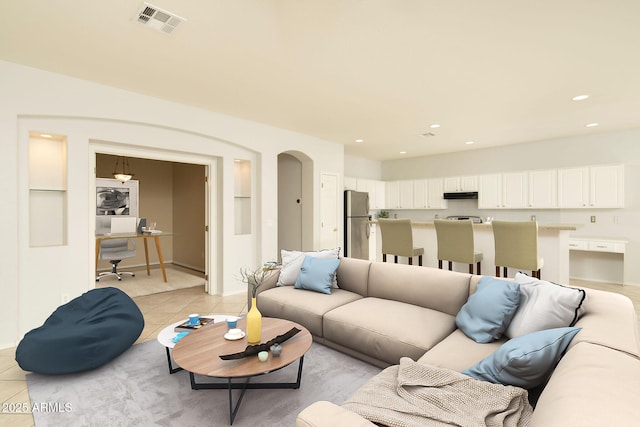 living room featuring light tile patterned floors