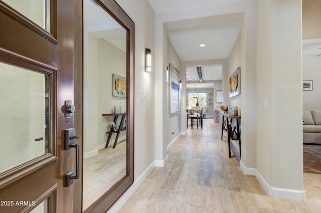 hall featuring light hardwood / wood-style flooring