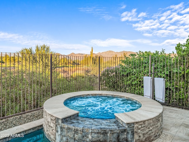 view of pool featuring a mountain view