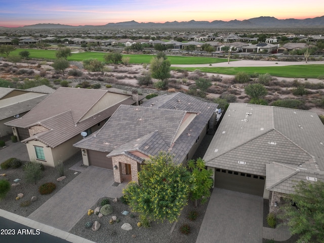 aerial view at dusk with a mountain view