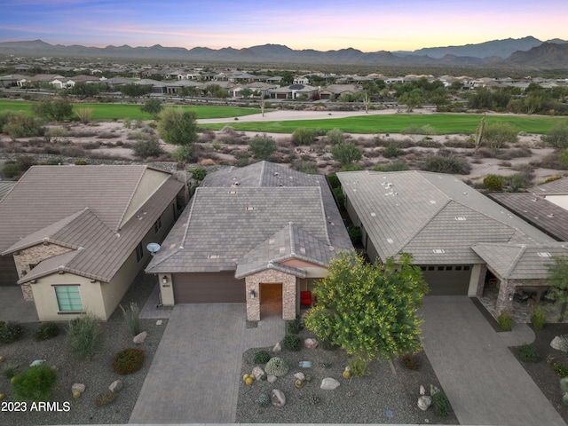 aerial view at dusk with a mountain view