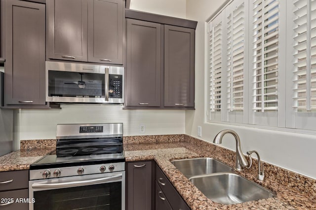 6202 E Mckellips Rd Unit 25, Mesa, AZ 85215 - kitchen featuring stainless steel appliances, a sink, and stone countertops