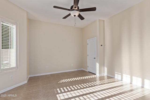 6202 E Mckellips Rd Unit 25, Mesa, AZ 85215 - spare room featuring ceiling fan and baseboards