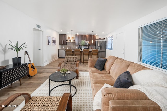 living room featuring light hardwood / wood-style flooring