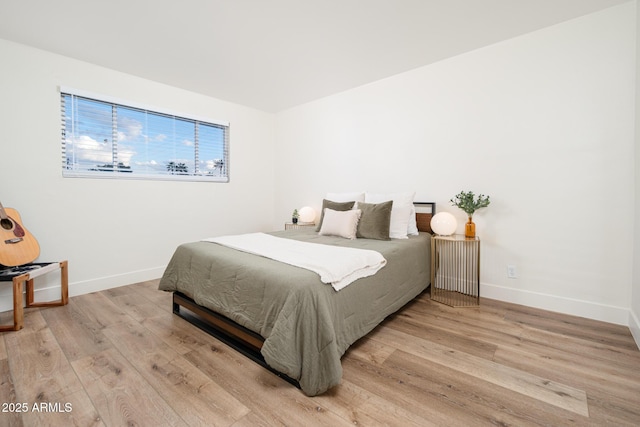 bedroom with light hardwood / wood-style floors