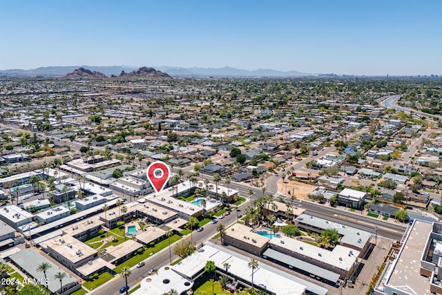 birds eye view of property featuring a mountain view