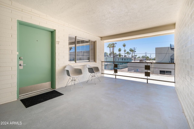 view of patio with a balcony