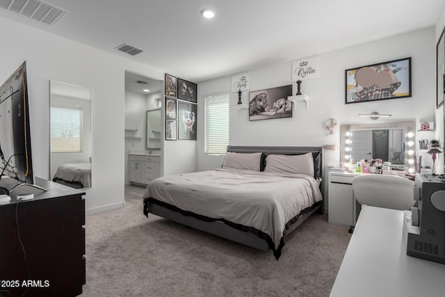 bedroom featuring multiple windows, carpet, and visible vents