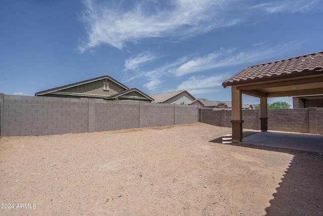 view of yard featuring a fenced backyard and a patio
