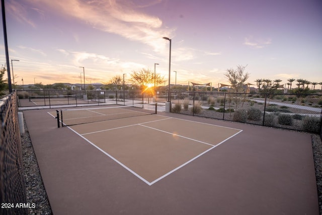 view of sport court with fence