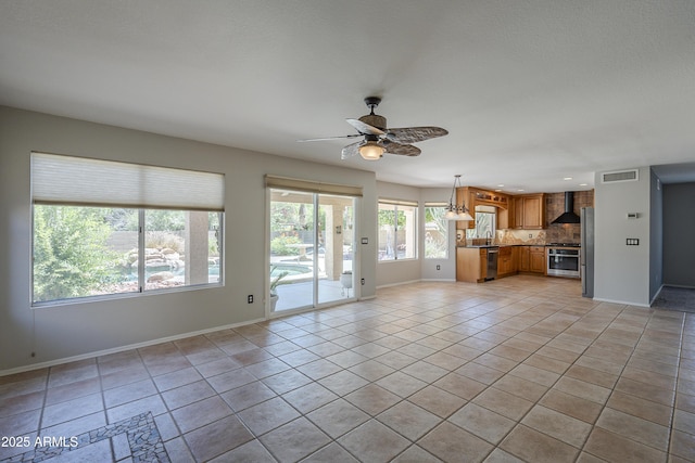 2340 W Myrtle Dr, Chandler, AZ 85248 - unfurnished living room featuring ceiling fan, light tile patterned flooring, and recessed lighting