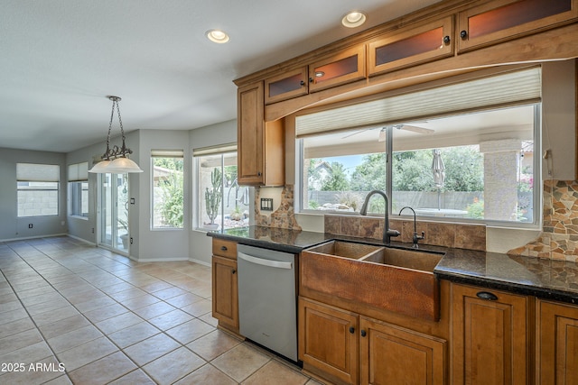2340 W Myrtle Dr, Chandler, AZ 85248 - kitchen featuring dishwasher, brown cabinetry, decorative backsplash, light tile patterned floors, and glass insert cabinets