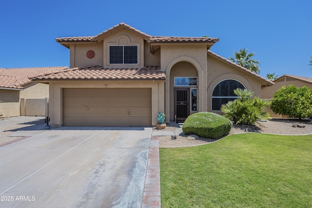 2340 W Myrtle Dr, Chandler, AZ 85248 - mediterranean / spanish-style house with driveway, stucco siding, a tiled roof, and a front lawn