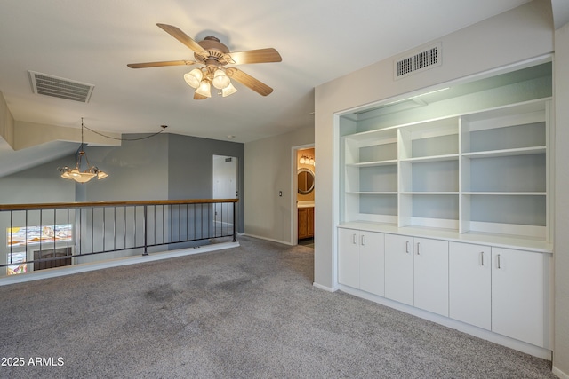 2340 W Myrtle Dr, Chandler, AZ 85248 - unfurnished room featuring light carpet, a ceiling fan, and a chandelier