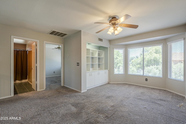 2340 W Myrtle Dr, Chandler, AZ 85248 - spare room with a ceiling fan and carpet floors