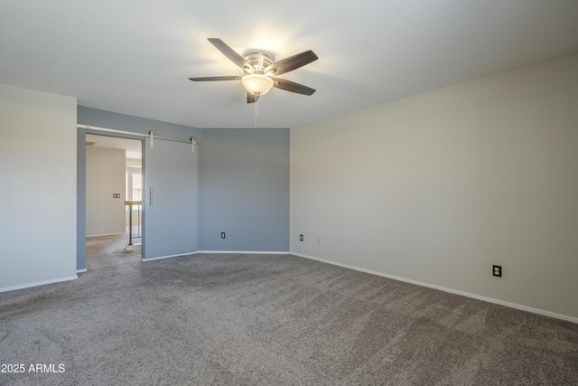 2340 W Myrtle Dr, Chandler, AZ 85248 - carpeted empty room with ceiling fan and a barn door