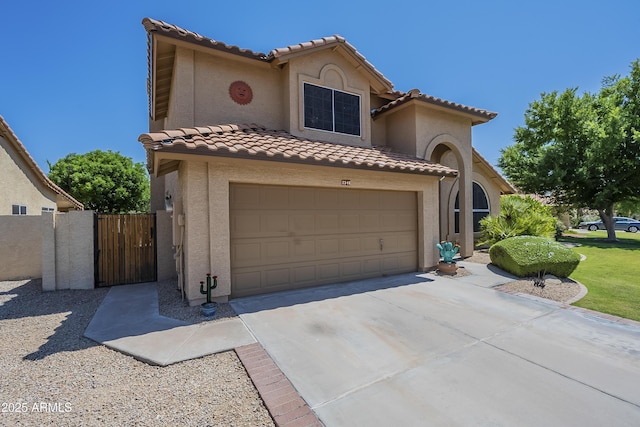 2340 W Myrtle Dr, Chandler, AZ 85248 - mediterranean / spanish house with a tiled roof, stucco siding, driveway, a garage, and a gate